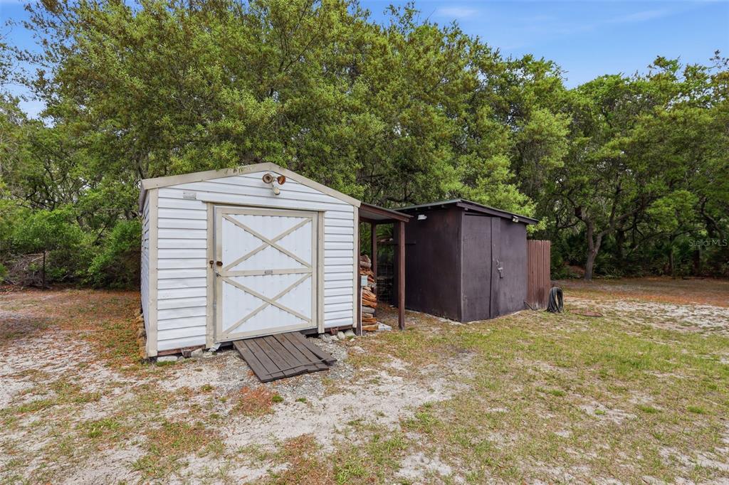 41736 Apollo Lane DeLand, FL 32720 - Photo 36 of 49 a front view of a house with a yard and garage