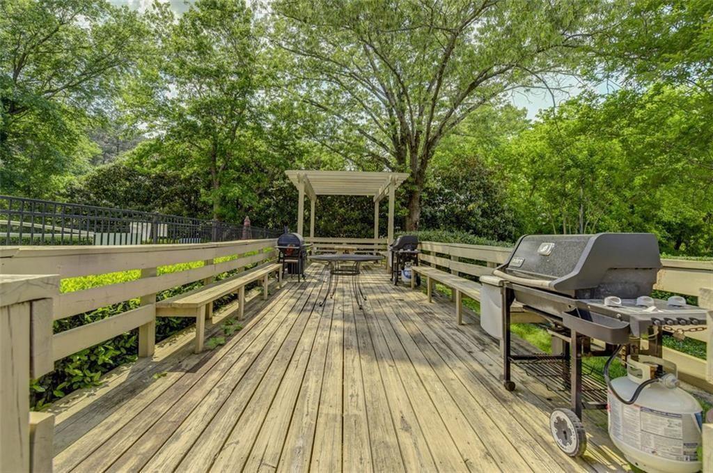 1501 Clairmont Road, Unit 1917 Decatur, GA 30033 - Photo 3 of 10 a view of balcony with wooden floor and outdoor seating