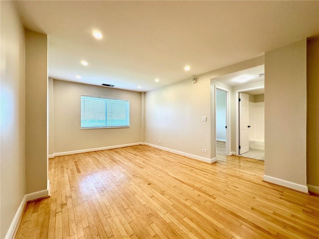 1501 Clairmont Road, Unit 1917 Decatur, GA 30033 - Photo 4 of 10 a view of an empty room and wooden floor