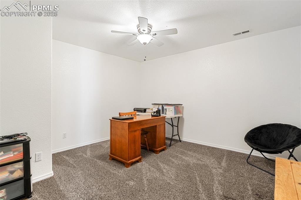 8135 Buschborn Road Peyton, CO 80831 - Photo 39 of 47 Basement office or extra room.