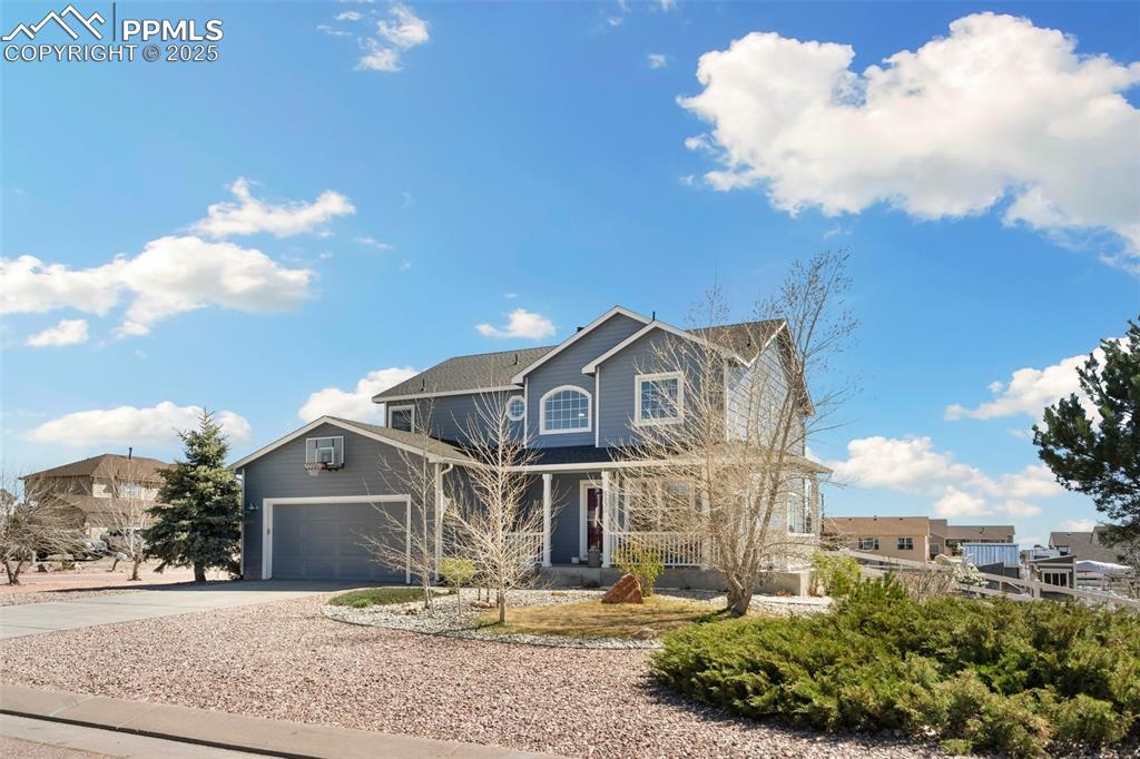 8135 Buschborn Road Peyton, CO 80831 - Photo 9 of 47 Beautiful, low maintenance landscaping front and back.