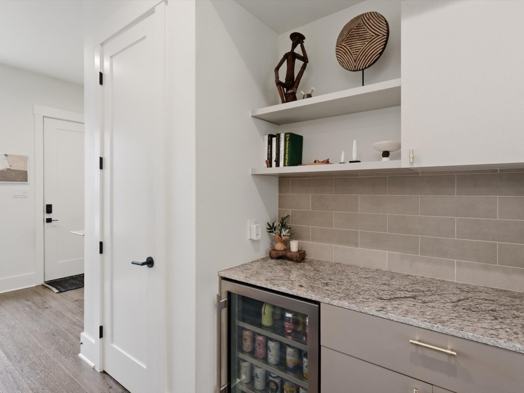 4606 Fisk Street, Unit B Houston, TX 77009 - Photo 15 of 38 a kitchen with a cabinets and a stove