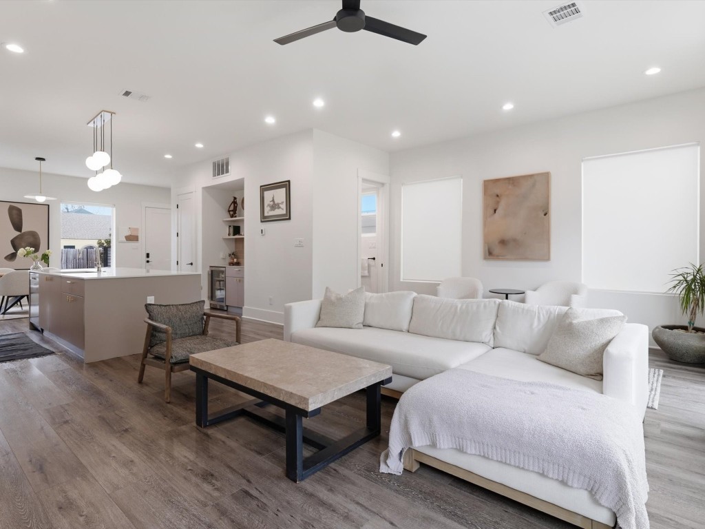 4606 Fisk Street, Unit B Houston, TX 77009 - Photo 16 of 38 a living room with furniture and a wooden floor