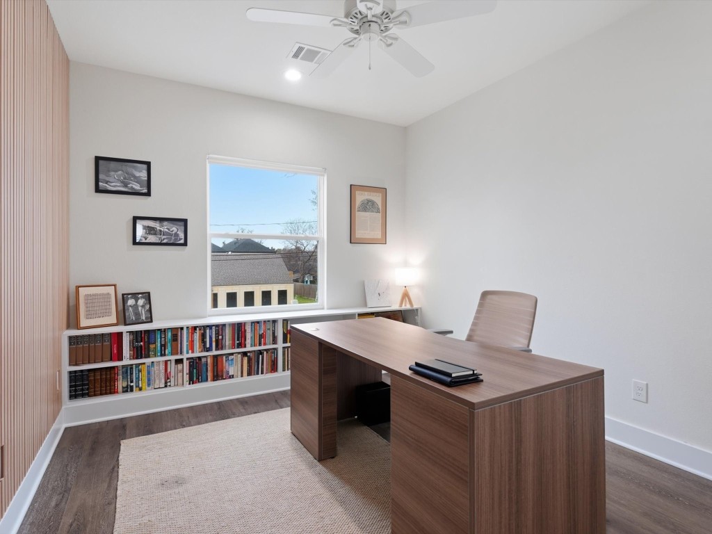 4606 Fisk Street, Unit B Houston, TX 77009 - Photo 28 of 38 a kitchen that has a stove and a table in it