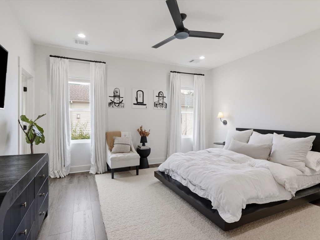 4606 Fisk Street, Unit B Houston, TX 77009 - Photo 3 of 38 a bedroom with a bed and furniture