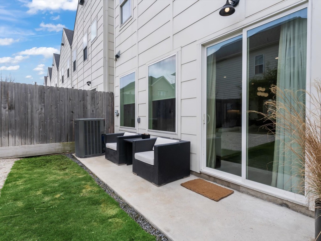 4606 Fisk Street, Unit B Houston, TX 77009 - Photo 34 of 38 a view of a patio with table and chairs and potted plants