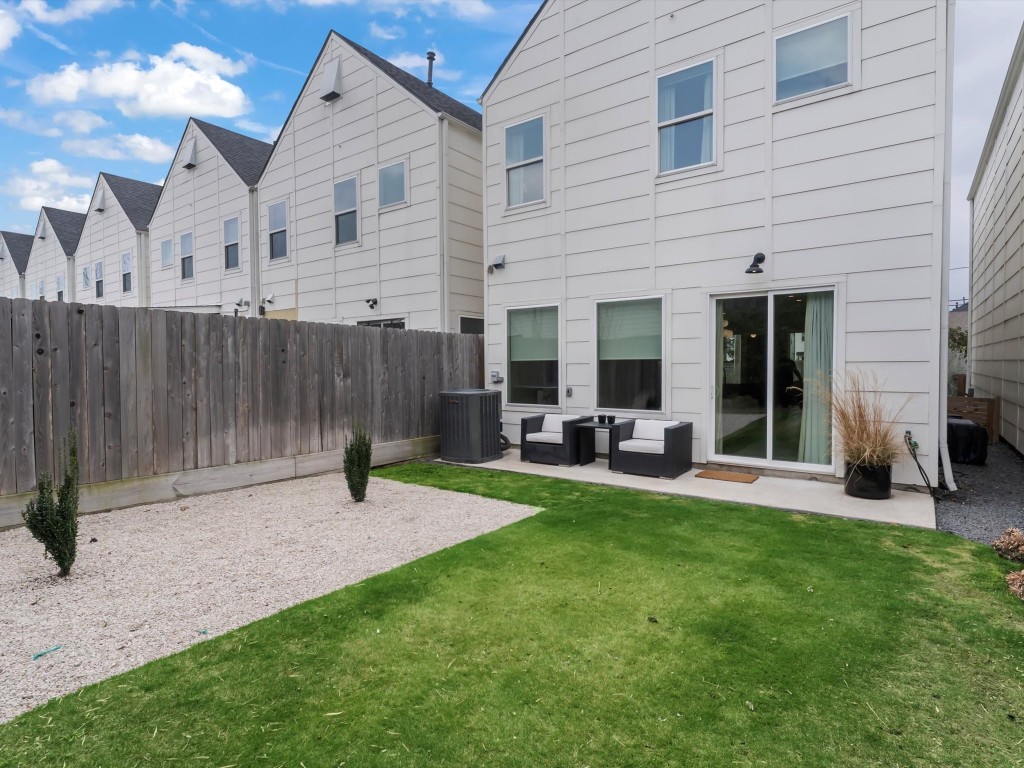 4606 Fisk Street, Unit B Houston, TX 77009 - Photo 4 of 38 a view of a house with backyard porch and sitting area