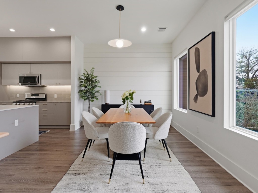 4606 Fisk Street, Unit B Houston, TX 77009 - Photo 10 of 38 a view of a dining room with furniture window and wooden floor