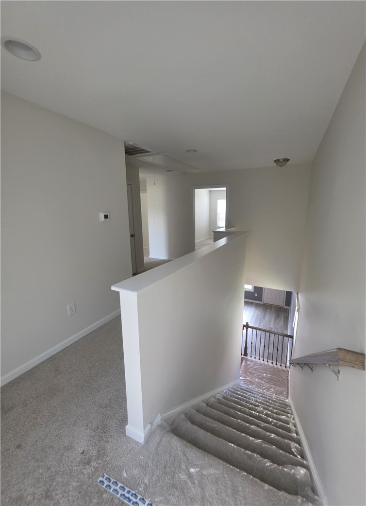 312 Phillips Drive Pendleton, SC 29670 - Photo 26 of 45 Upstairs hallway gives plenty of room to access all 3 bedrooms, 2 hall closets and a full bathroom.