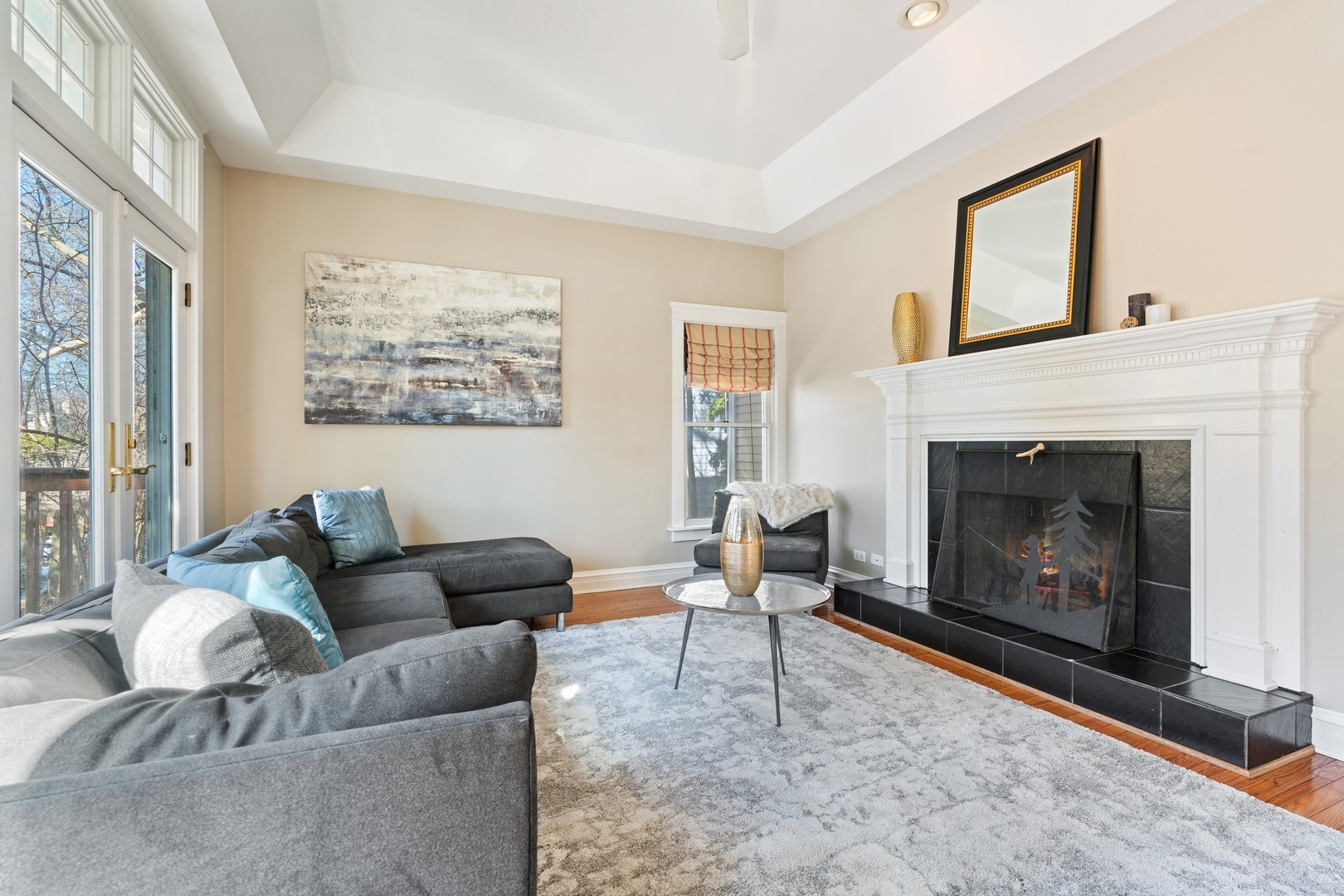 538 Exmoor Road Kenilworth, IL 60043 - Photo 14 of 45 a living room with furniture and a fireplace