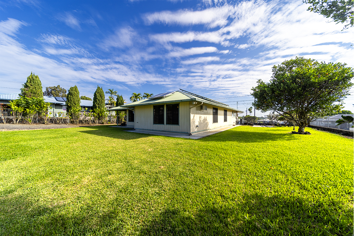 20 Naniakea Street Hilo, HI 96720 - Photo 23 of 29 a front view of house with yard and swimming pool