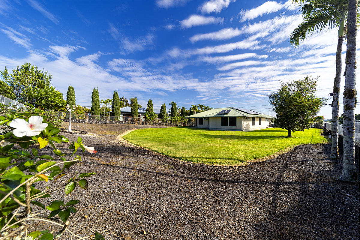 20 Naniakea Street Hilo, HI 96720 - Photo 24 of 29 a view of a house with a swimming pool