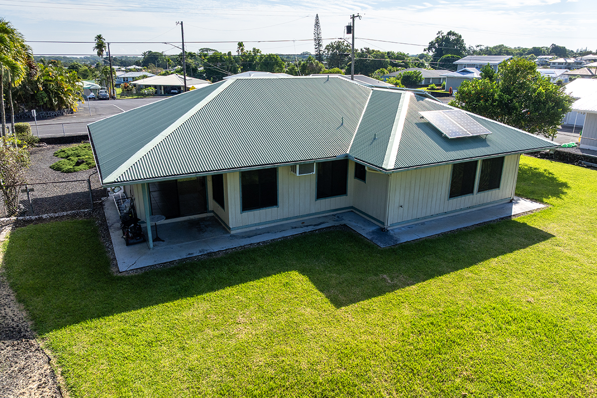 20 Naniakea Street Hilo, HI 96720 - Photo 25 of 29 a aerial view of a house with swimming pool