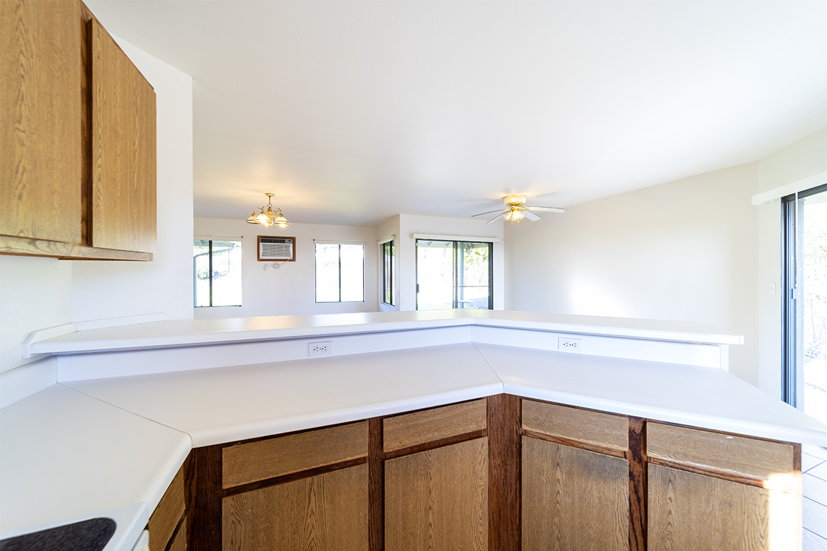 20 Naniakea Street Hilo, HI 96720 - Photo 8 of 29 a kitchen with a sink cabinets and a window