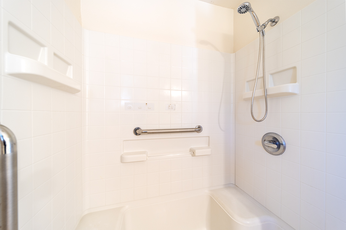 20 Naniakea Street Hilo, HI 96720 - Photo 10 of 29 a bathroom with a glass shower door