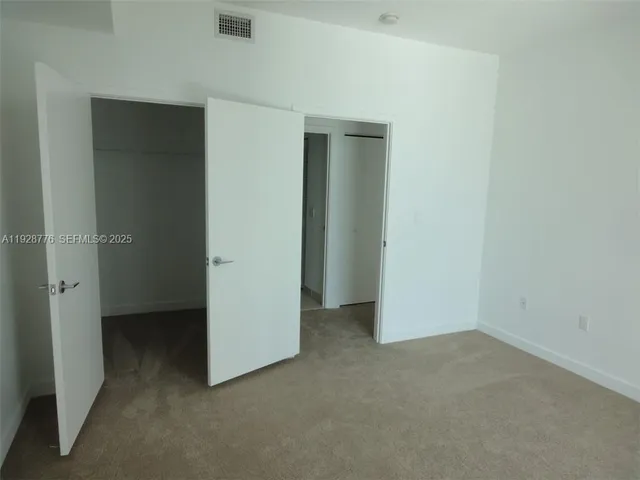 an empty room with closet