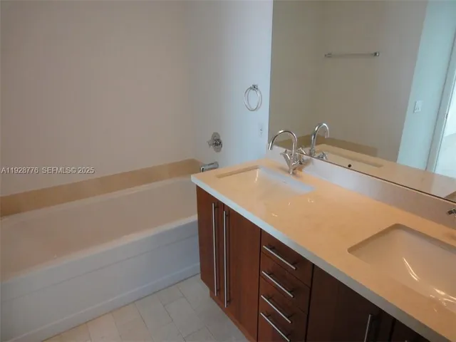 a bathroom with a sink and a bathtub