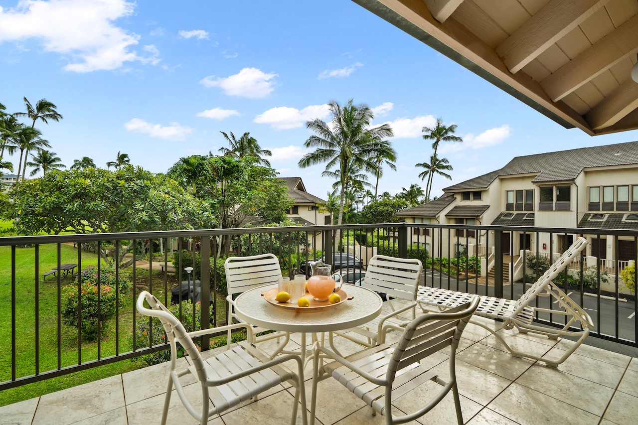 1901 Poipu Road, Unit 421 Koloa, HI 96756 - Photo 11 of 26 a view of a chairs and table on the terrace