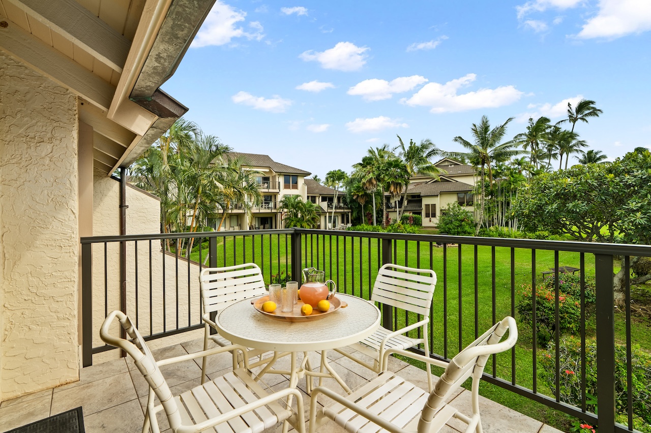 1901 Poipu Road, Unit 421 Koloa, HI 96756 - Photo 13 of 26 a view of a balcony with two chairs and a table