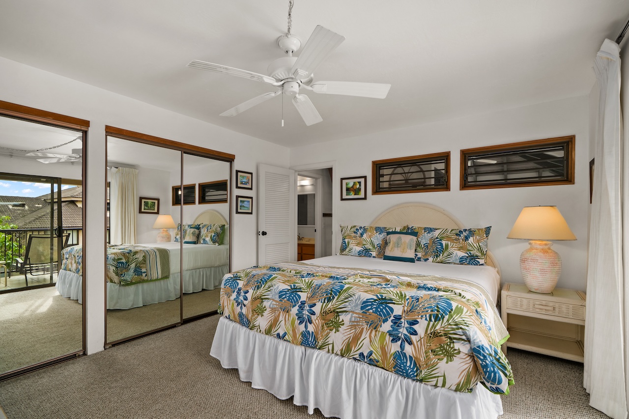 1901 Poipu Road, Unit 421 Koloa, HI 96756 - Photo 14 of 26 a bedroom with a bed and ceiling fan