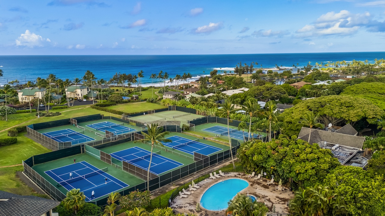 1901 Poipu Road, Unit 421 Koloa, HI 96756 - Photo 2 of 26 a view of a pool with lawn chairs