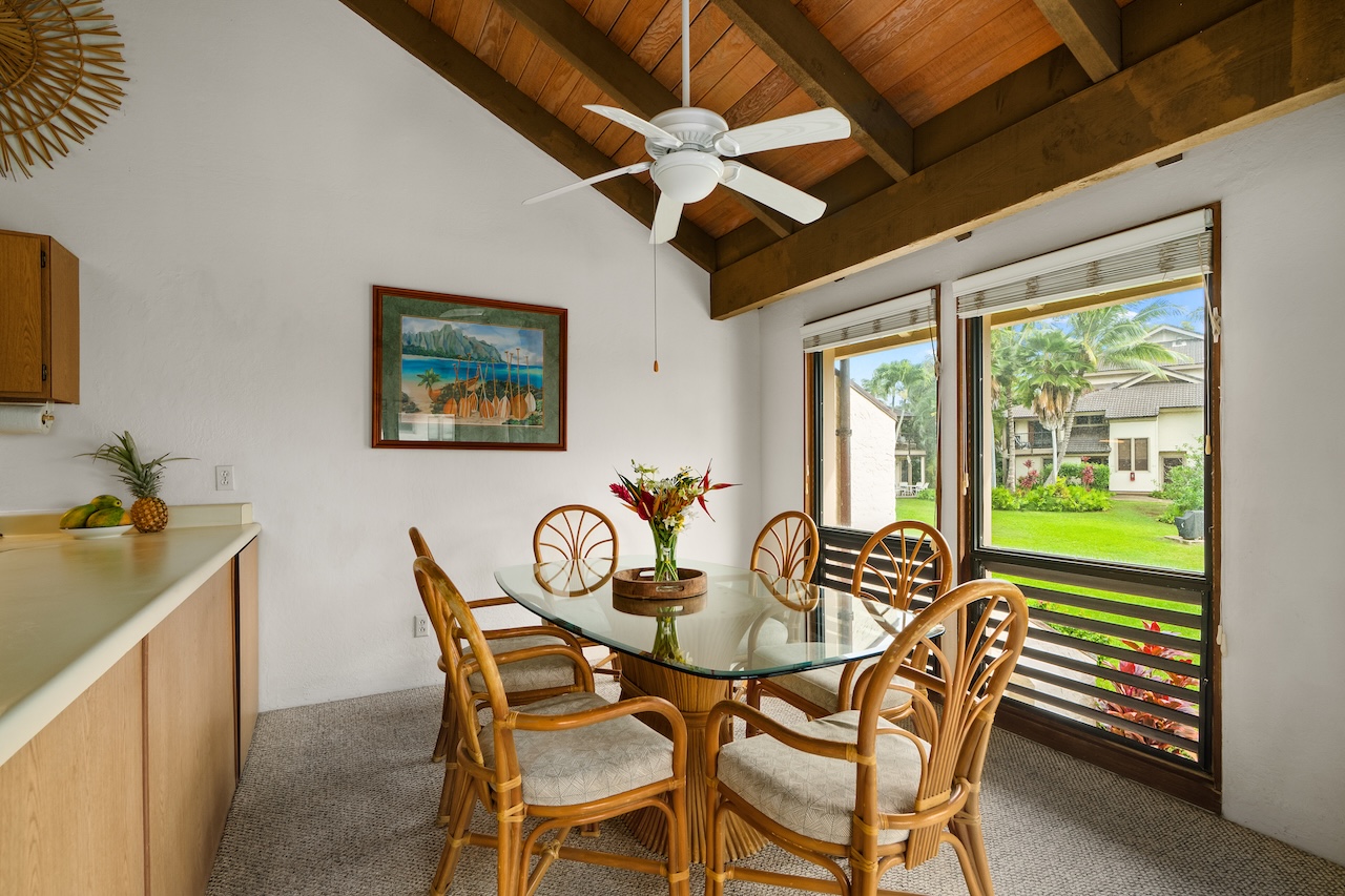 1901 Poipu Road, Unit 421 Koloa, HI 96756 - Photo 10 of 26 a dining room with furniture and window