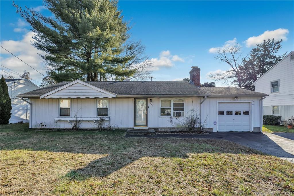 396 Intervale Road Bridgeport, CT 06610 - Photo 1 of 1 a front view of a house with garden