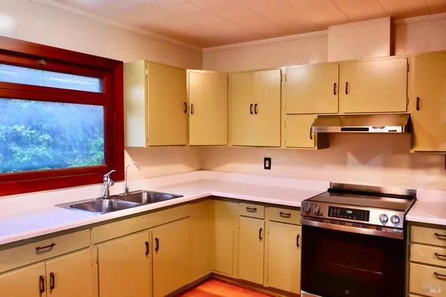 a view of hallway with a large window