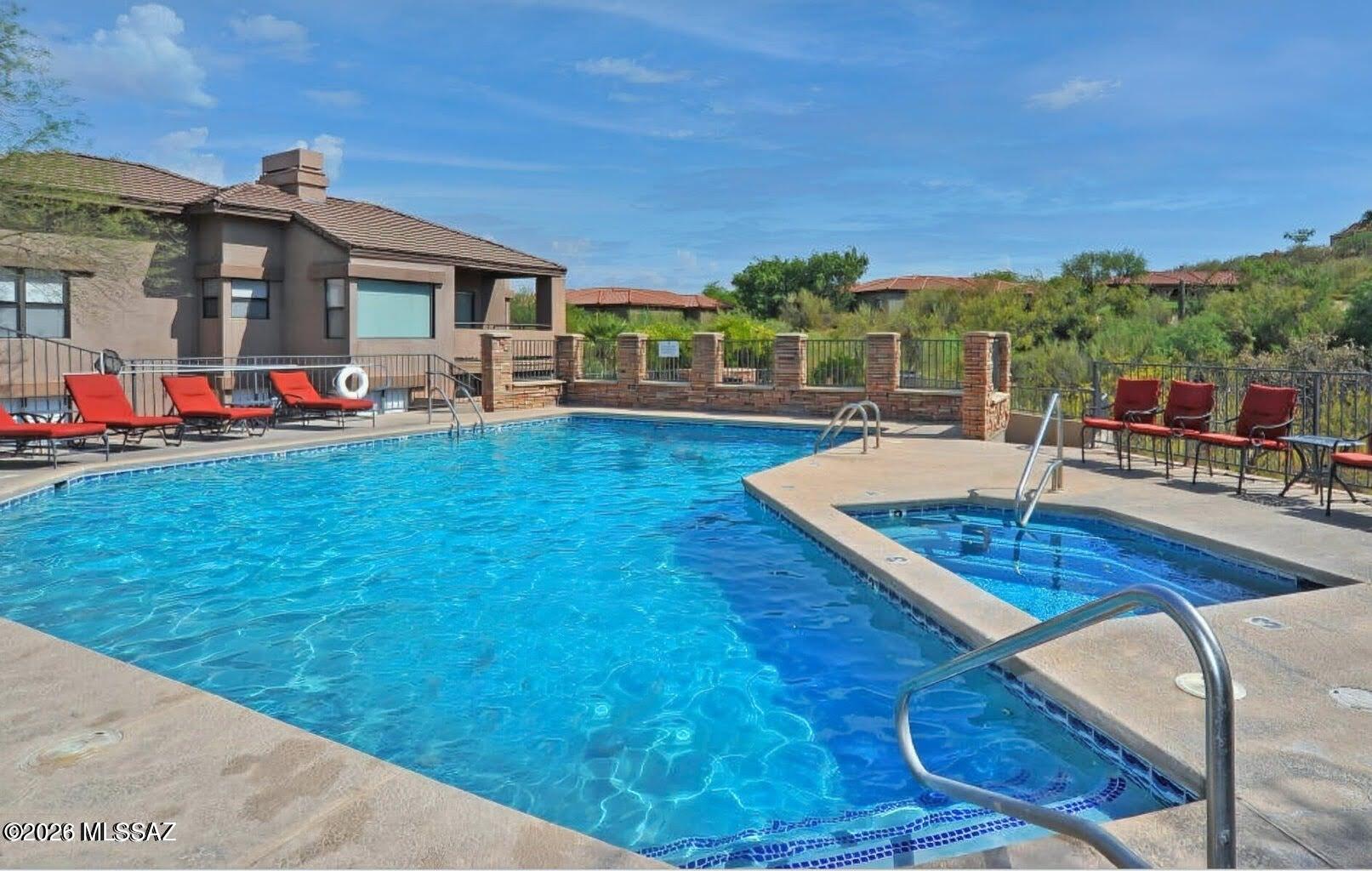 5855 North Kolb Road, Unit 11106 Tucson, AZ 85750 - Photo 33 of 36 a view of a house with swimming pool