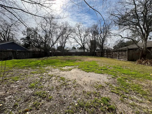 a view of a backyard with a garden