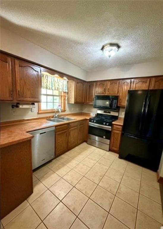 1239 Old State Road Apollo, PA 15613 - Photo 5 of 18 a kitchen with a sink a stove and refrigerator