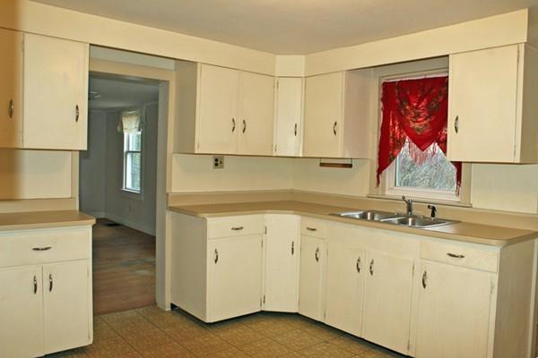 859 Greenfield Road Leyden, MA 01337 - Photo 12 of 42 a kitchen with a sink cabinets and wooden floor
