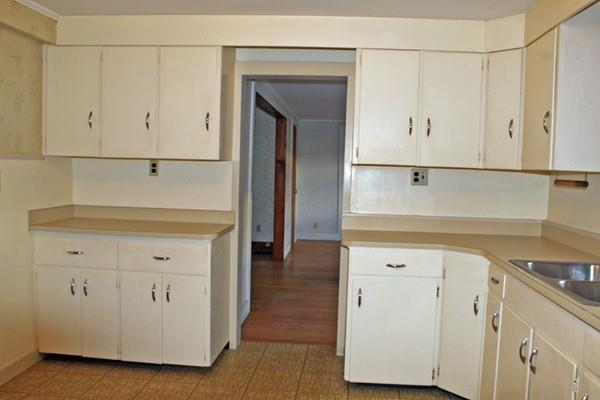 859 Greenfield Road Leyden, MA 01337 - Photo 13 of 42 a view of cabinets with wooden floor