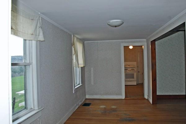 859 Greenfield Road Leyden, MA 01337 - Photo 16 of 42 a view of livingroom with an empty space and a window