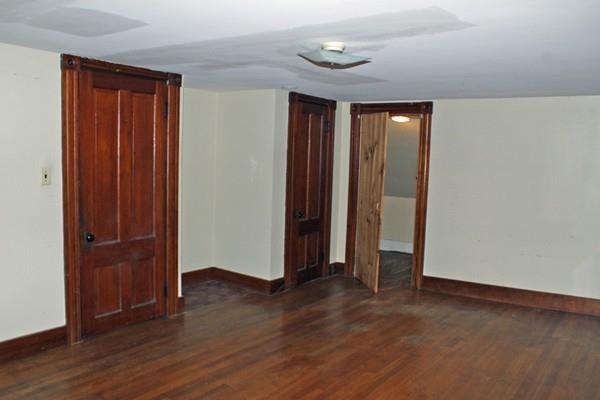 859 Greenfield Road Leyden, MA 01337 - Photo 30 of 42 an empty room with wooden floor and closet