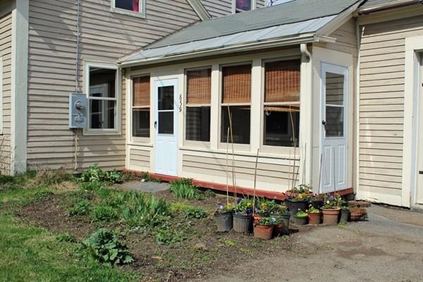 859 Greenfield Road Leyden, MA 01337 - Photo 4 of 42 a front view of a house with a patio