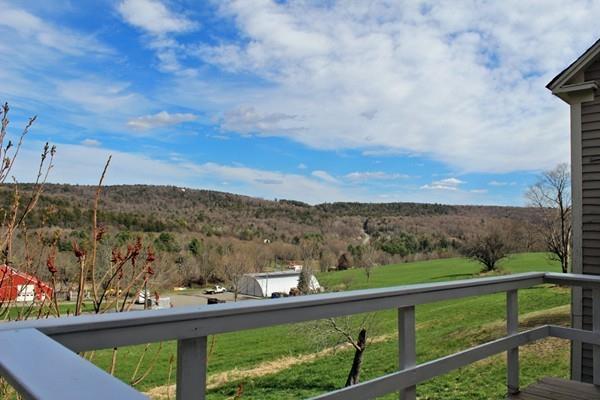 859 Greenfield Road Leyden, MA 01337 - Photo 9 of 42 a view of a city from a balcony
