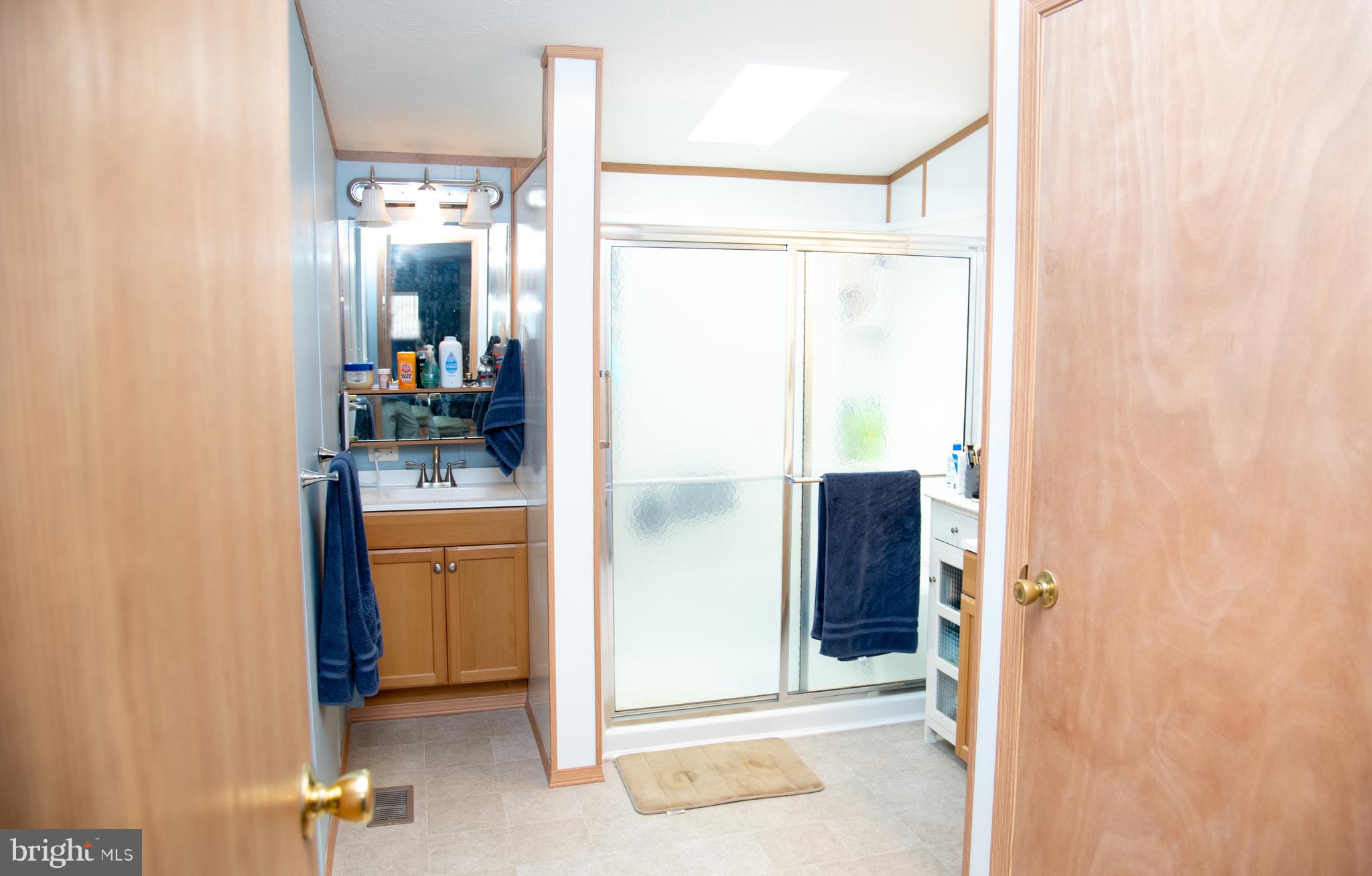 104 Raptor Drive Hanover, PA 17331 - Photo 15 of 30 a bathroom with a shower and a sink