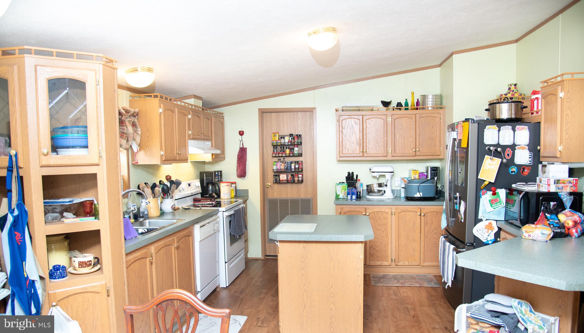 104 Raptor Drive Hanover, PA 17331 - Photo 16 of 30 a kitchen with stainless steel appliances granite countertop a refrigerator and stove