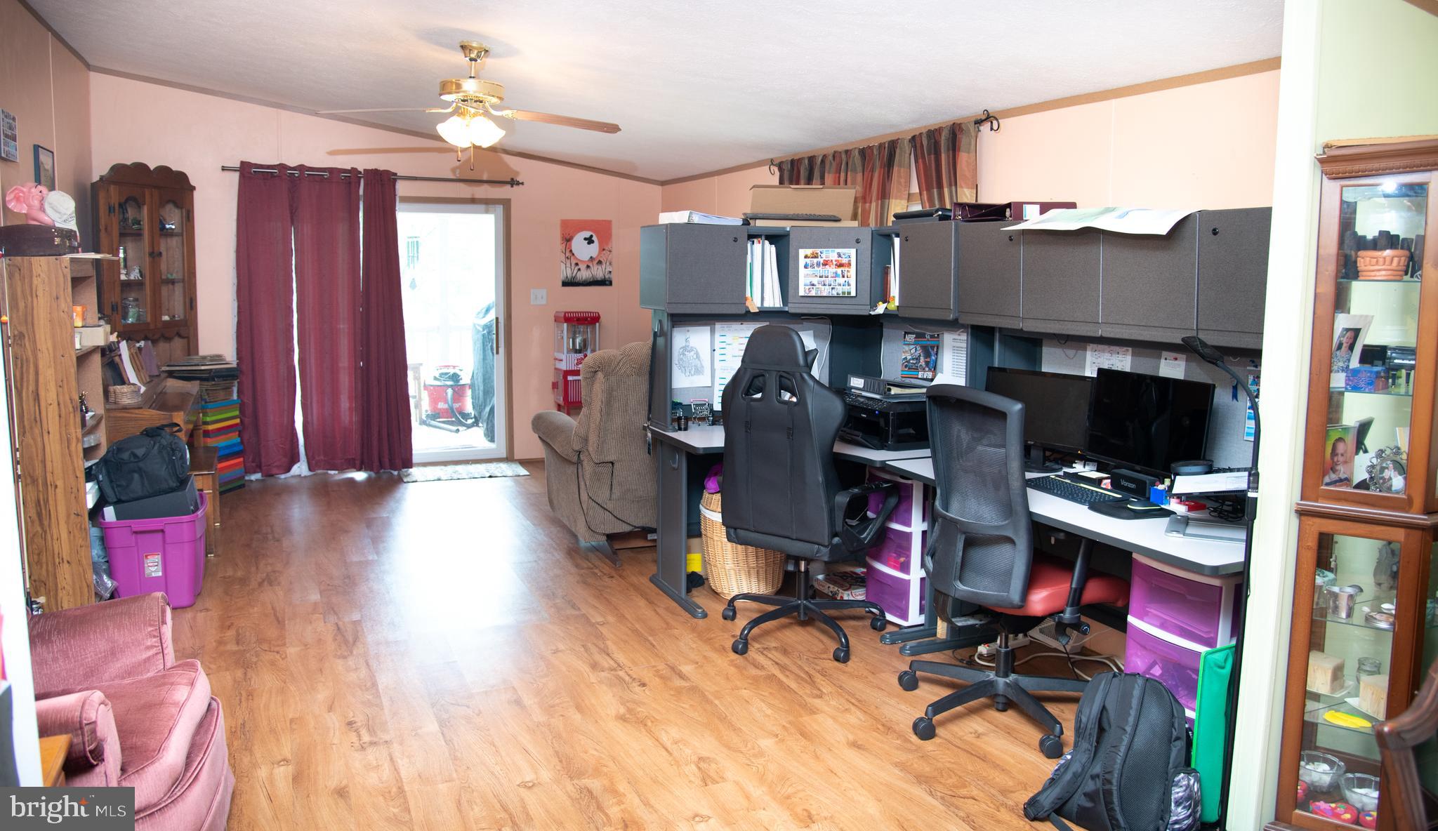 104 Raptor Drive Hanover, PA 17331 - Photo 21 of 30 a view of a livingroom with workspace and a window