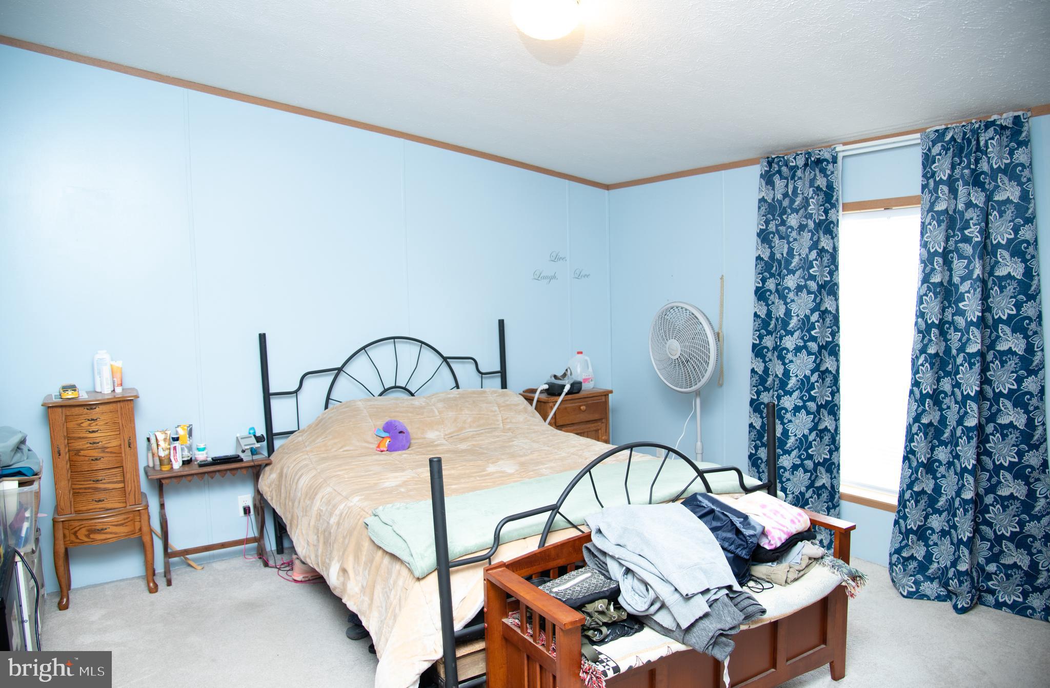 104 Raptor Drive Hanover, PA 17331 - Photo 26 of 30 a bedroom with bed and a window