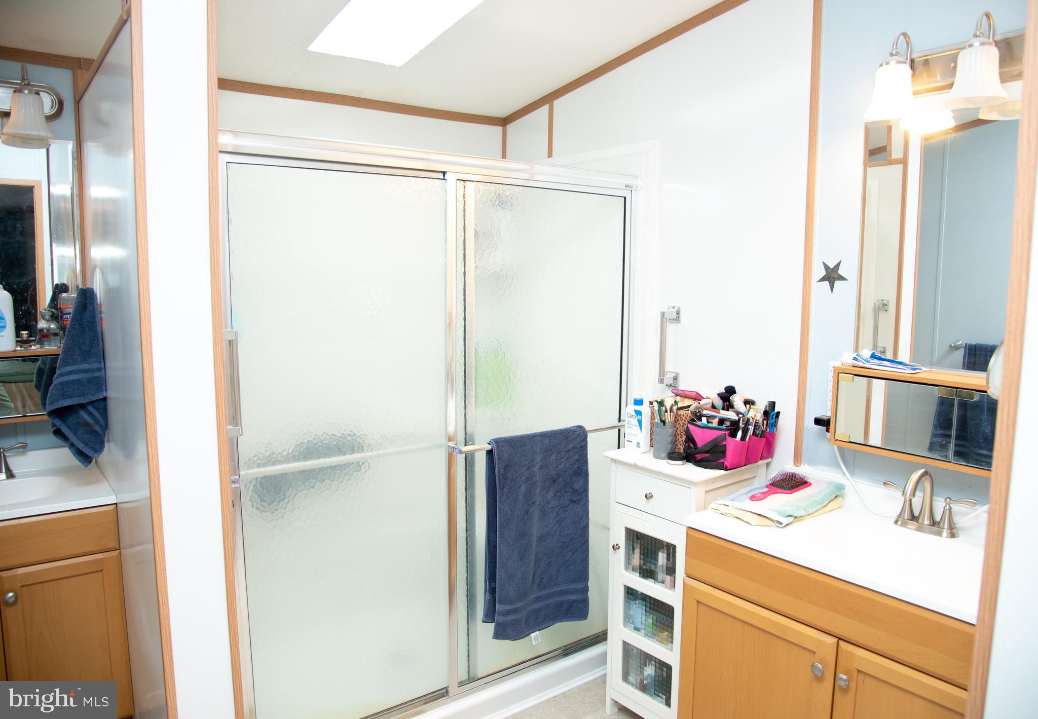 104 Raptor Drive Hanover, PA 17331 - Photo 28 of 30 a bathroom with a sink and a mirror