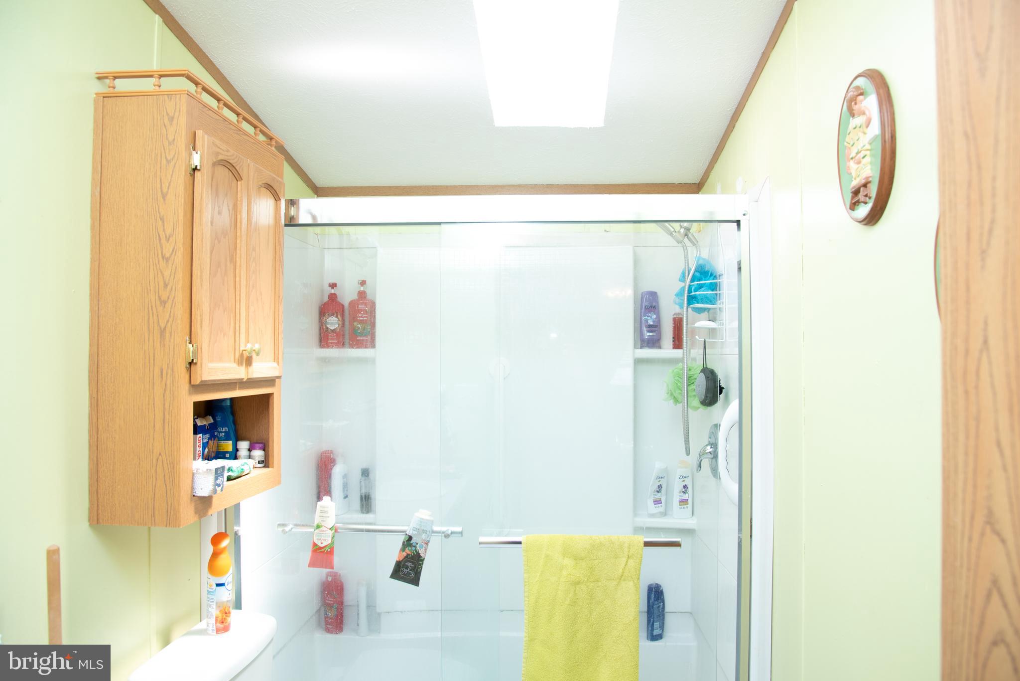104 Raptor Drive Hanover, PA 17331 - Photo 29 of 30 a bathroom with a bathtub and a shower