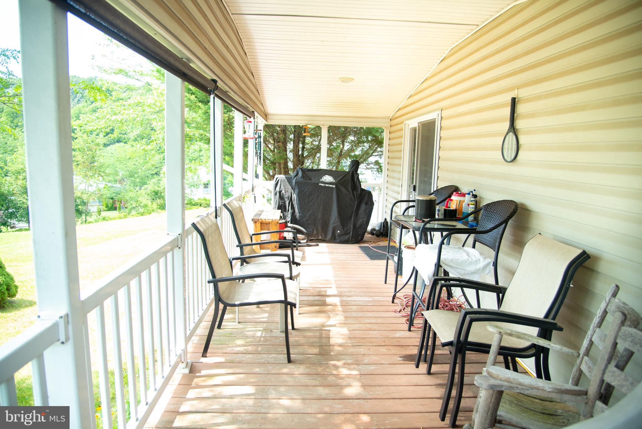 104 Raptor Drive Hanover, PA 17331 - Photo 9 of 30 a view of a chairs and table in balcony