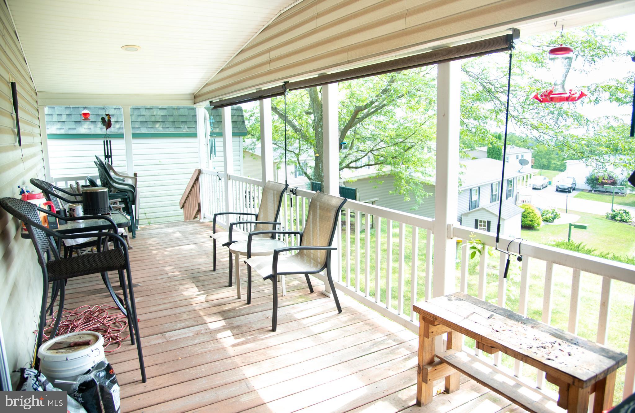 104 Raptor Drive Hanover, PA 17331 - Photo 10 of 30 a view of a room with wooden floor and furniture