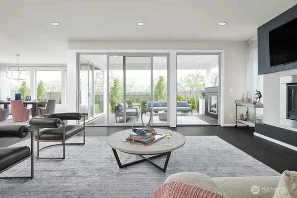a living room with fireplace furniture and a flat screen tv