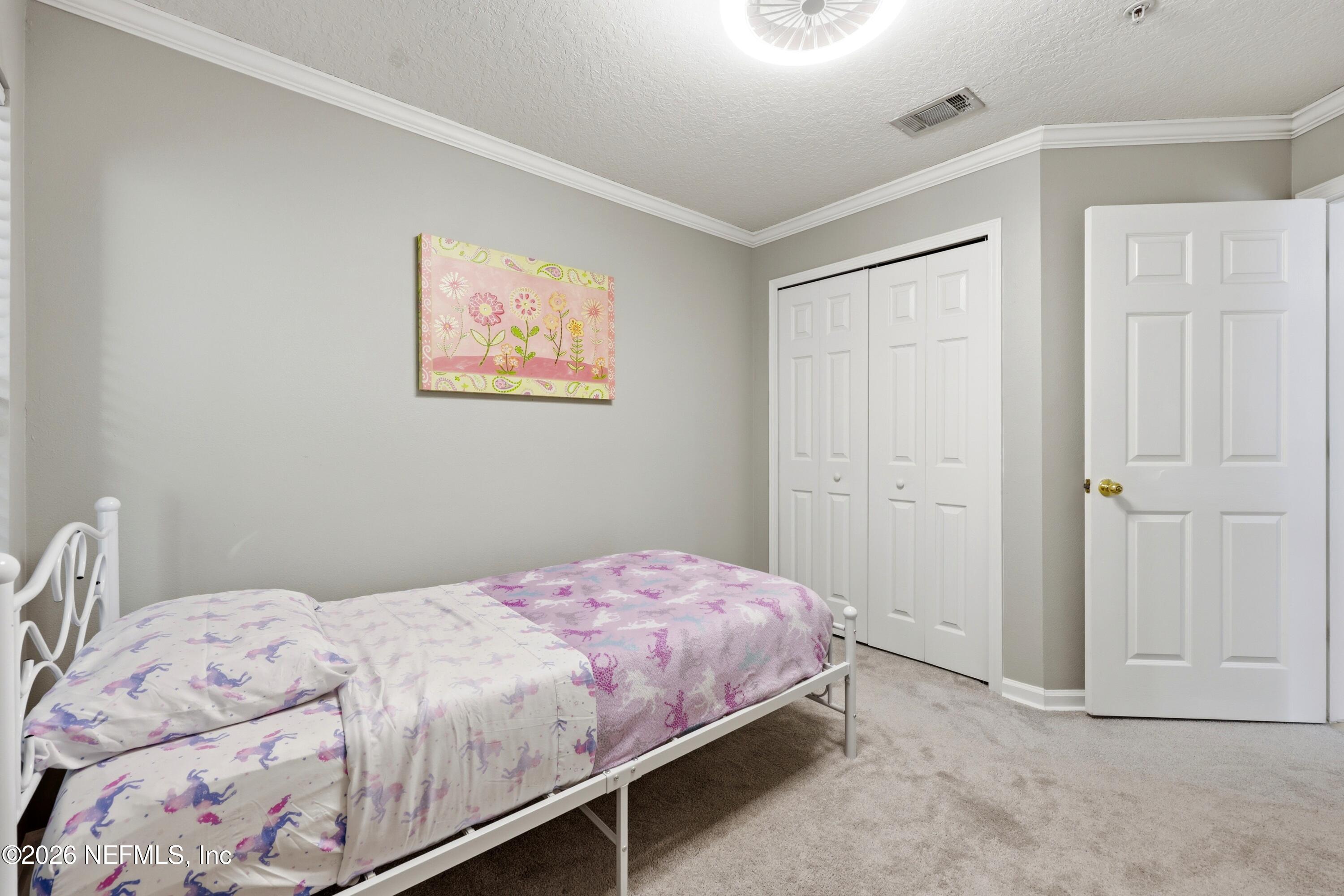 7920 Merrill Road, Unit 411 Jacksonville, FL 32277 - Photo 21 of 36 Bedroom 2