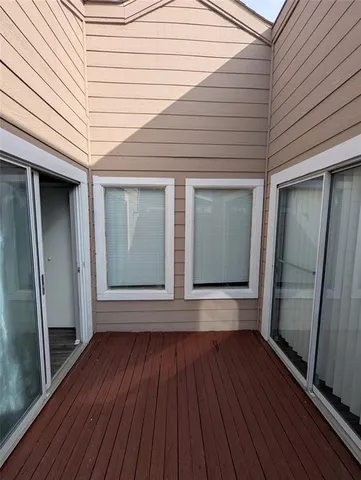 a view of outdoor space and wooden floor