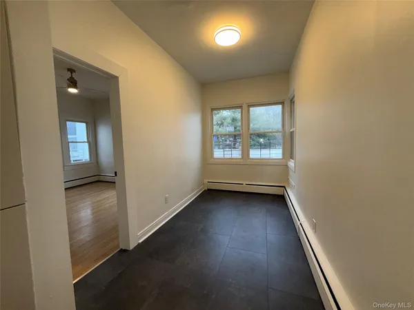 an empty room with windows