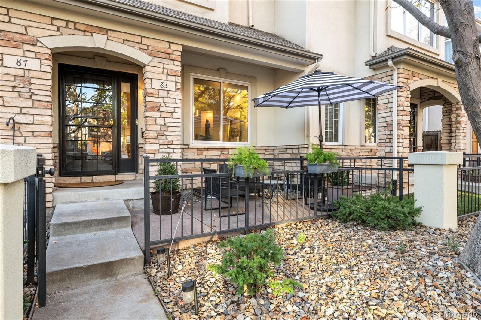 83 South Monroe Street Denver, CO 80209 - Photo 2 of 19 a view of a building with a porch